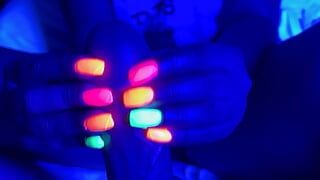 Black light glowing nail handjob