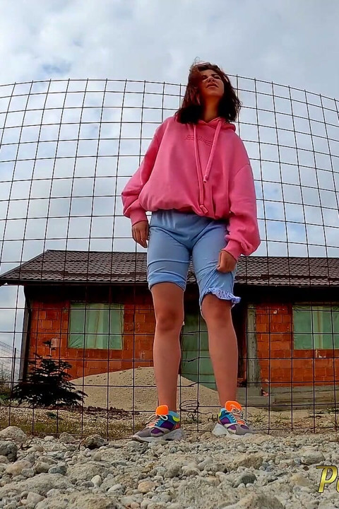 Changing her wet shorts into dry pants