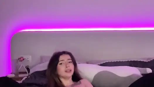 Adrianna Savu, a cosplaying school-girl, wears stockings and heels witho...