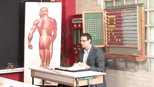 Brunette teen penetrated on the college desk by the teacher