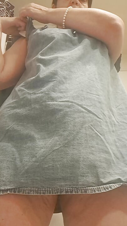 taking off her underwear to put her fingers in her wet vagina