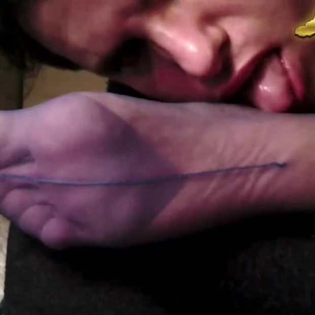 Trans is licking foot in pantyhose and masturbates