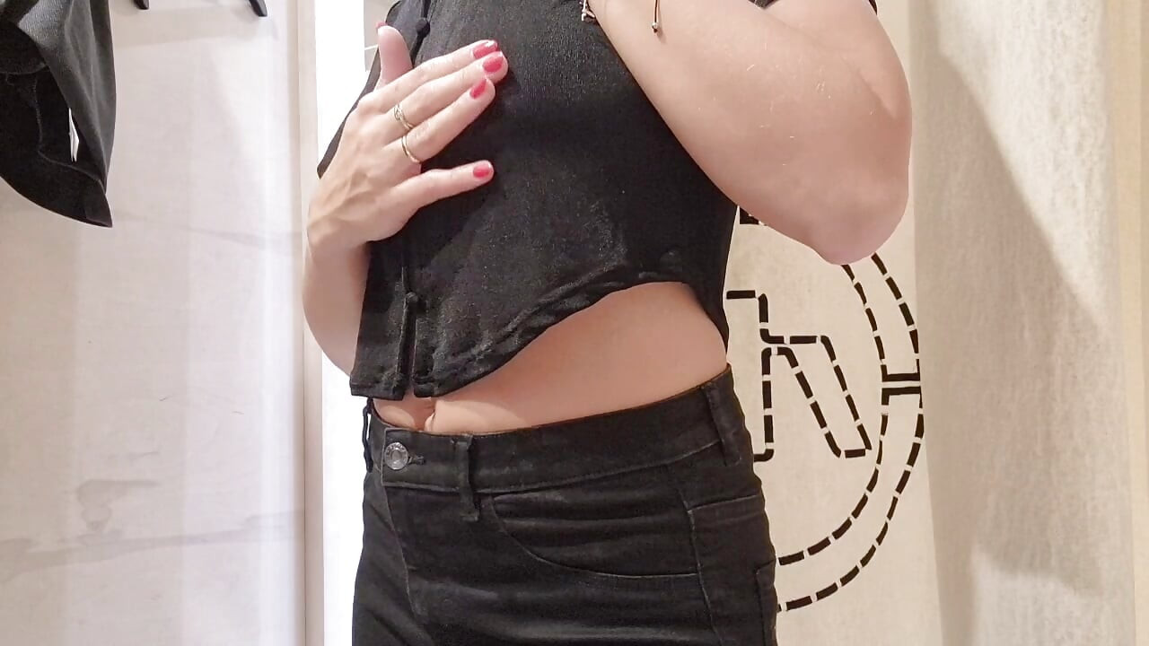flashing tits in the fitting room with the curtain open