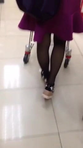 Asian woman at supermarket
