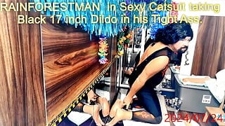 RAINFORESTMAN in Catsuit taking Black 17 inch Dildo in his Tight Ass.