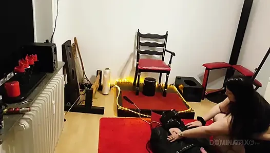 Curvy Brunette Dominatrix Commands Bound Slave in Fetish Dungeon