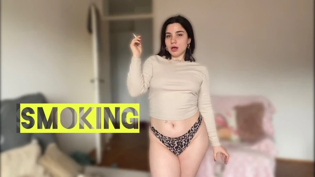 Sexy tattooed model smokes Marlboro red