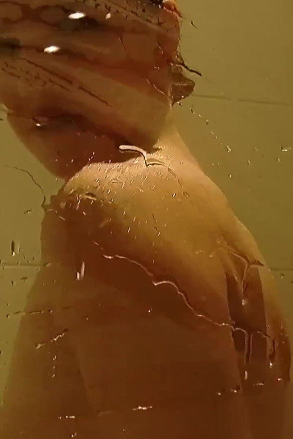 Cute brunette babe enjoys masturbating in the bathroom