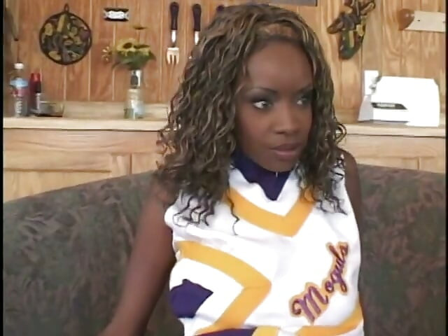 Pretty ebony cheerleader enjoys white cock banging