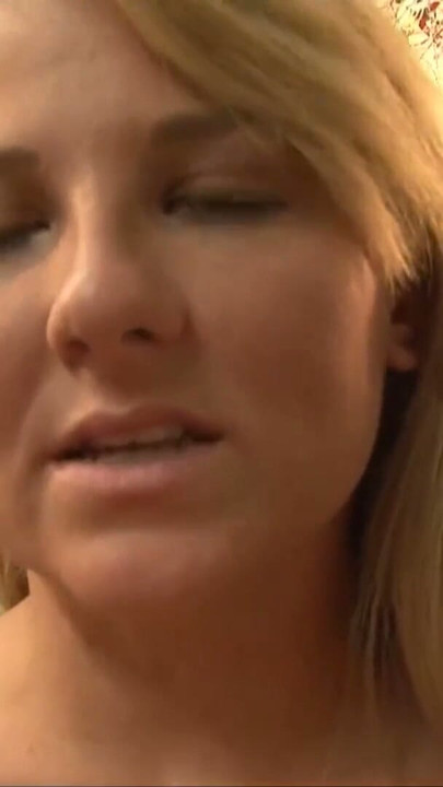 The submissive guy cannot help but allow the blonde femdom to bite and perform ballbusting | Clip 2