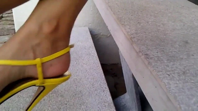 Yellow High Heels, Red Nails