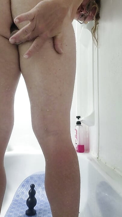 Jenkins off in the tub with a super long dildo all the way up my ass cumshot in my hand and some on the camera