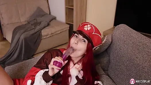 Horny redhead slut Toffina plays with a purple dildo.