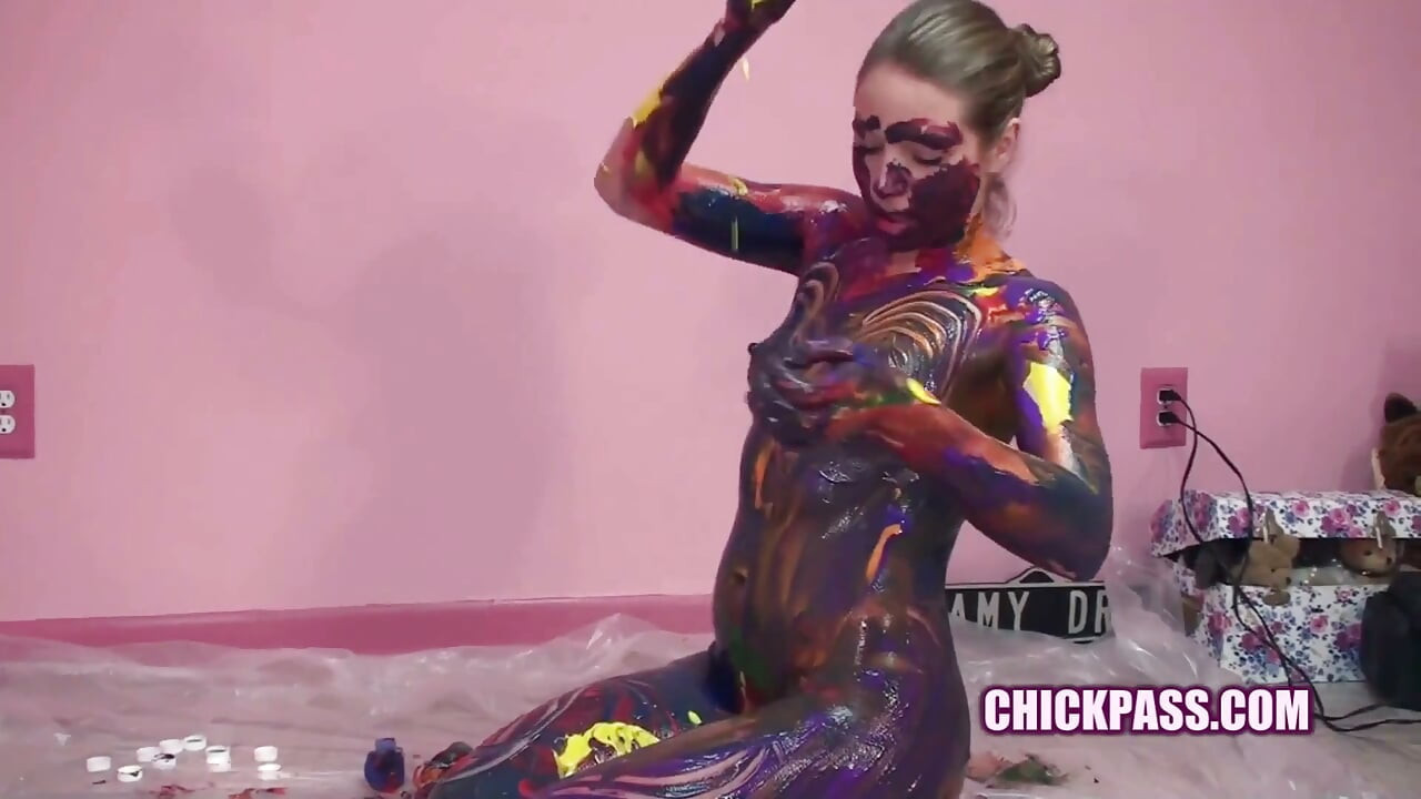 Kinky coed Lina is covered in paint