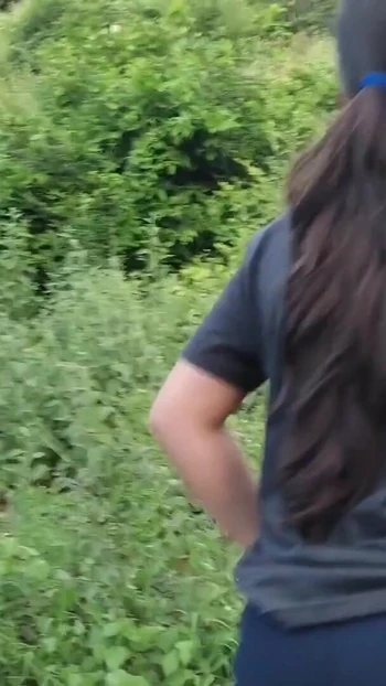 Stunning moment from "A cute slim Latina girl walks outdoors and flashes her big boobs and ass"