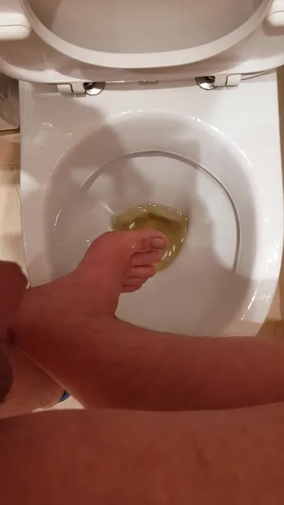 Male piss feet