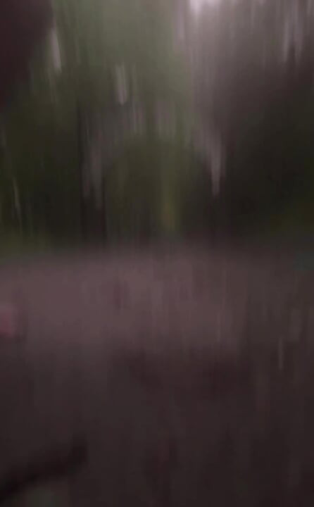 Long naked barefoot walk from car to a welcome to my town sign