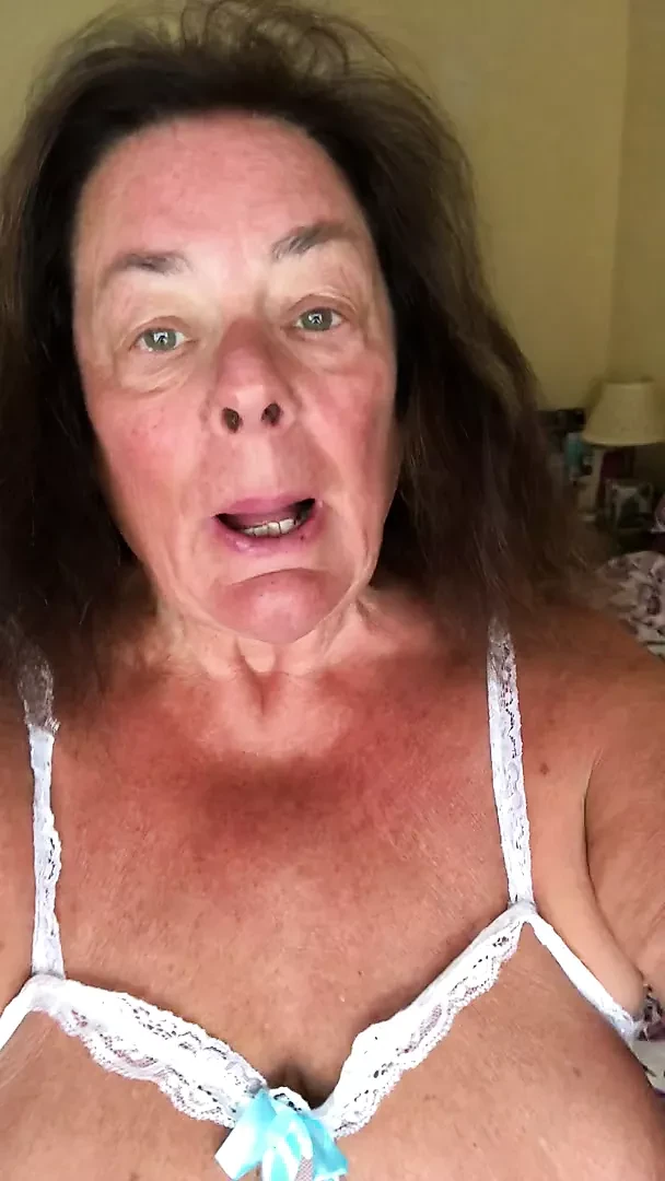 Slave in white showing off tits and cunt