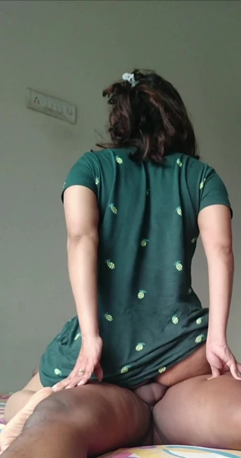 Captivating moment from "GREEN TOP DESI GIRLFRIEND RIDE BOYFRIEND CUM ON ASS"