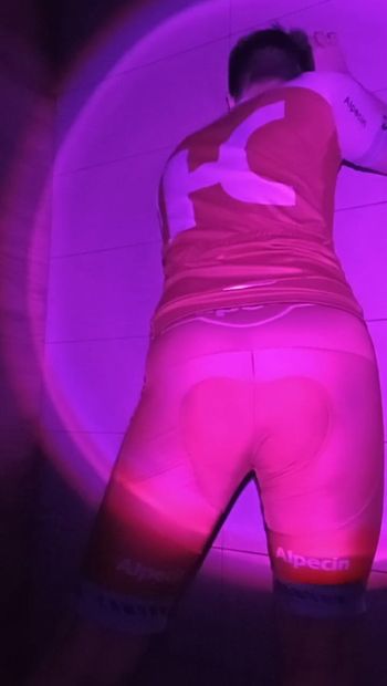 Cute twink shows her big ass in a tight sexy cycling suit
