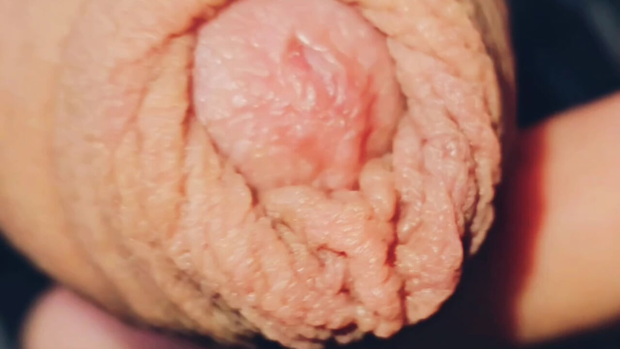 Horny uncut guy playing with long foreskin again precum and cum