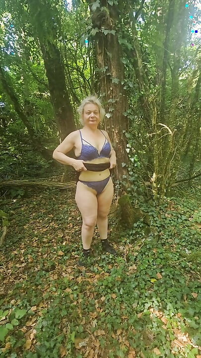 I was touching myself in the woods when a voyeur caught me and fucked my pussy.