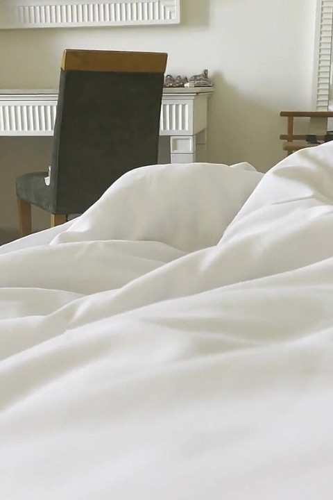 Stepmom Shares a Bed with Her Stepson in a Hotel Room