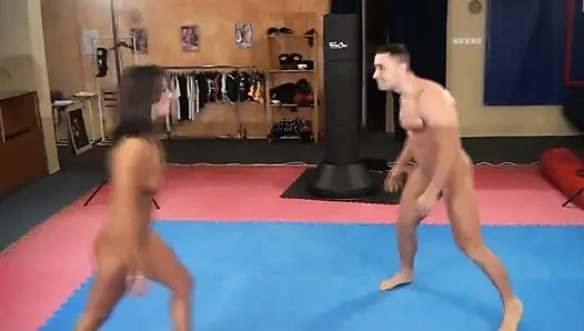 Young couple having wrestling match