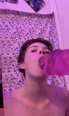 April sucking & deepthroating a dildo