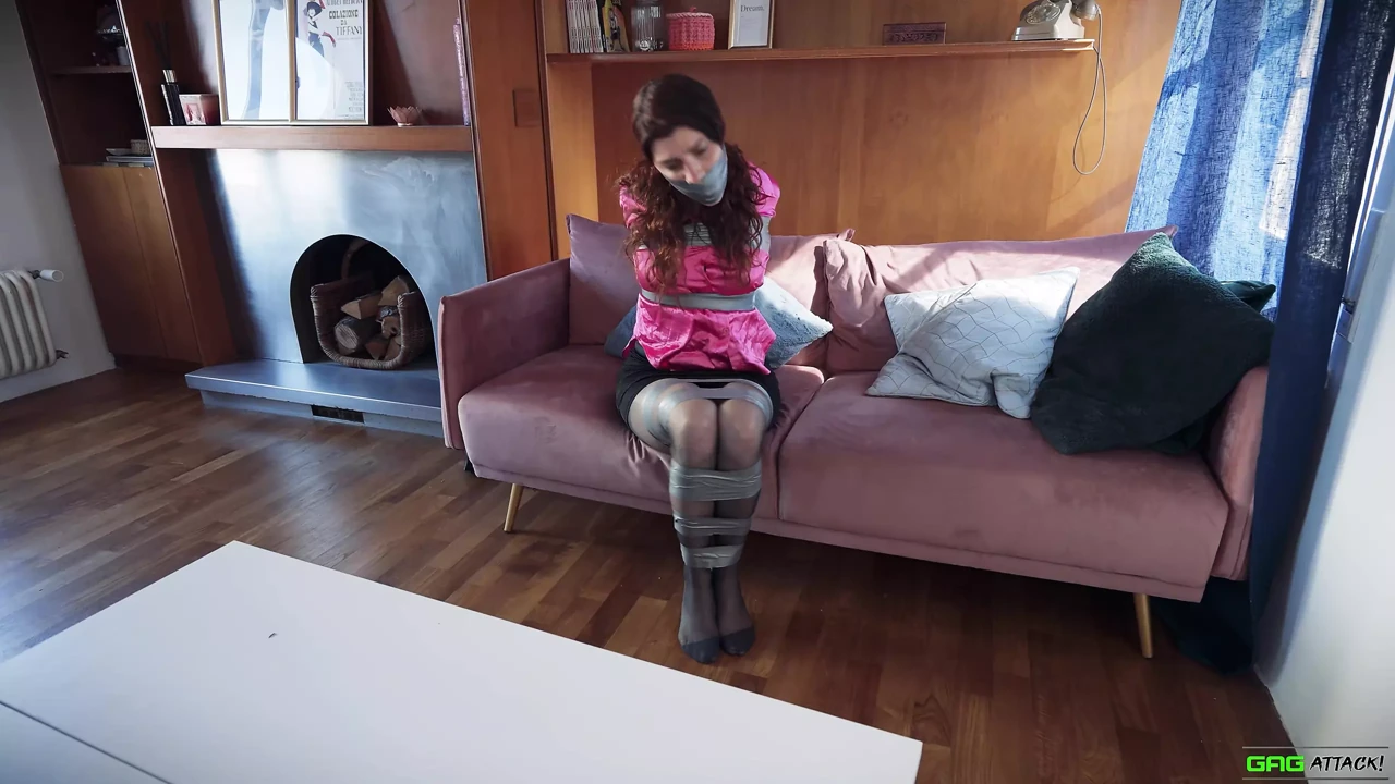 Multiple clips of woan in Bondage Bound Tape Gagged Rope Bound