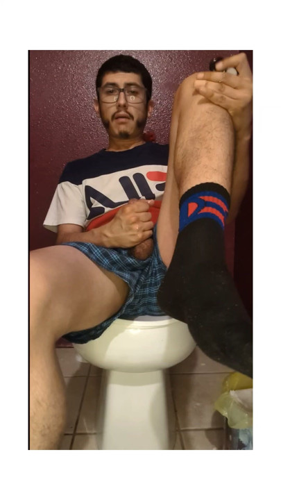 In my socks jacking off my cock with lube