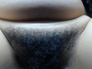 Mature mom shows her hairy cunt close-up