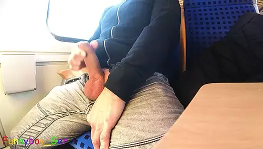 Very spontaneous, quick gay jerk off and big cumshot on a driving train.