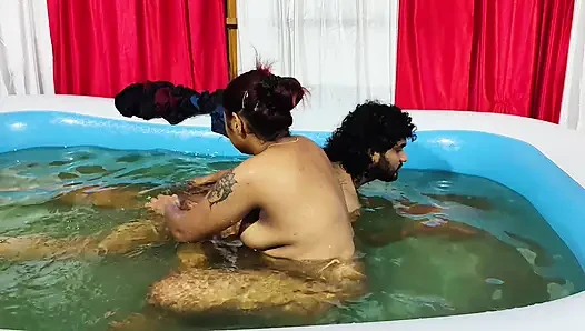 Couple bathing in pool