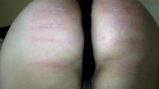 Creative caning with striptease