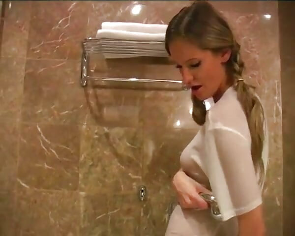 Sexy big boobs blonde in bathroom