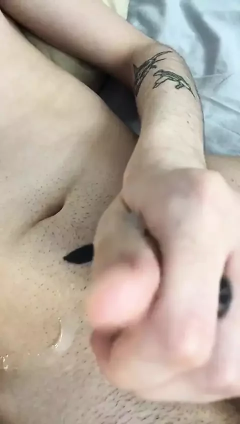 18 year old cute brunette jerks off his cock and cums a lot of cum