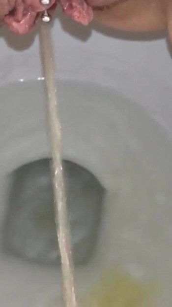 Thrilling moment from "Follow My Pretty Pierced Pussy Peeing"