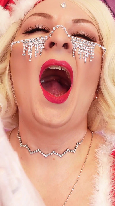 ASMR: beautiful yawning Santa girl wearing nitrile medical nurse gloves