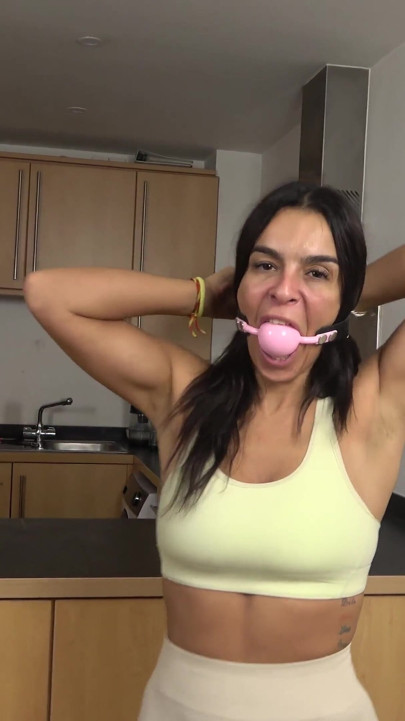 Latina's Personal Trainer Predicament: Giant Ballgag, Hogtie, and Drenching Drool! (4k)