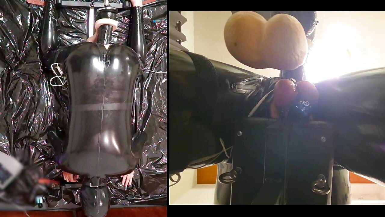Session in the pillory with Latex Catsuit, PA Chastity, Giant Didildo and Estim