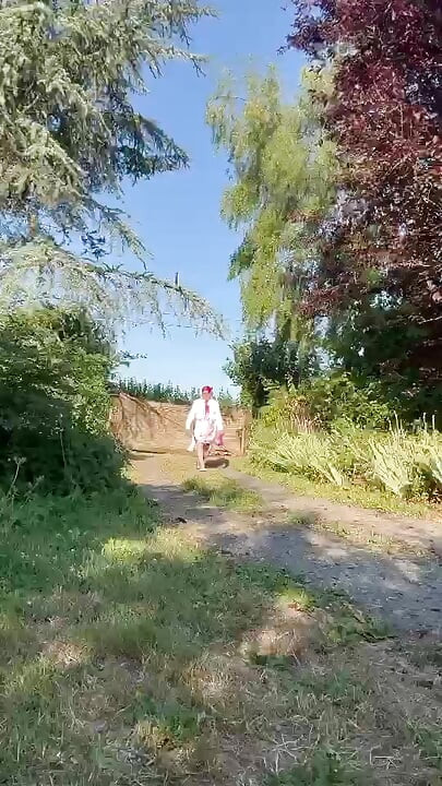 In little maid outfit with a short fuchsia skirt for a day