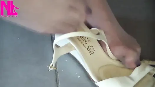 Nyllady Putting on Pantyhose and Footplay with Milk Colored Wedges