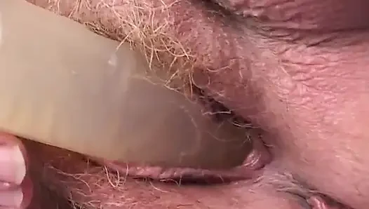 Old italian woman plays with a dildo dreaming a young cock