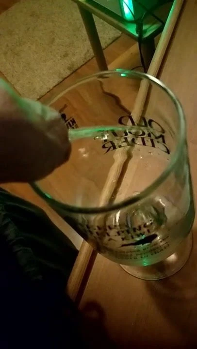 peeing it a glass