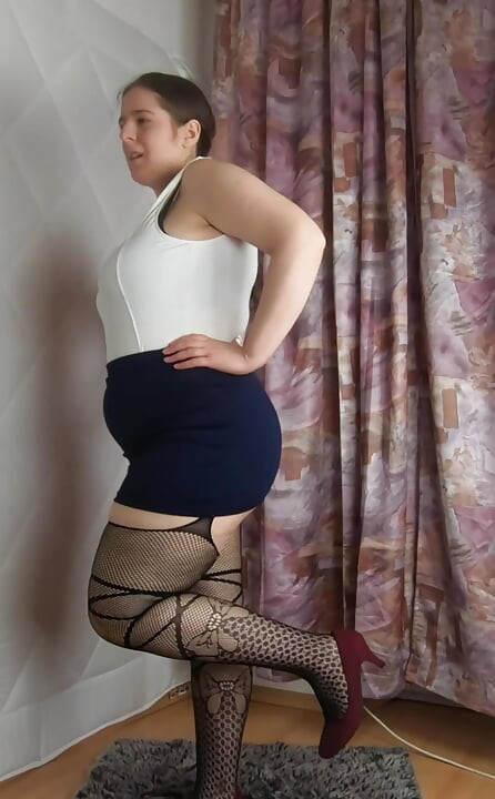 Mini skirt heels and fishnet stockings