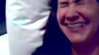 Brazilian chick laughing while getting facial