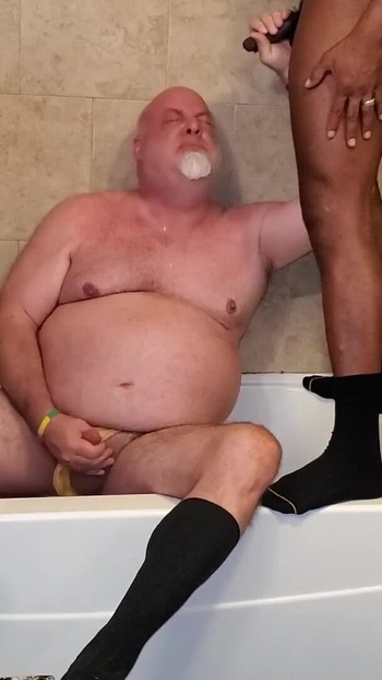 Stunning moment from "BEAR GETS PISSED ON by black dick!"