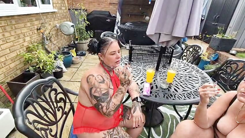 Joolz and Cheyenne Rose smoking in the garden