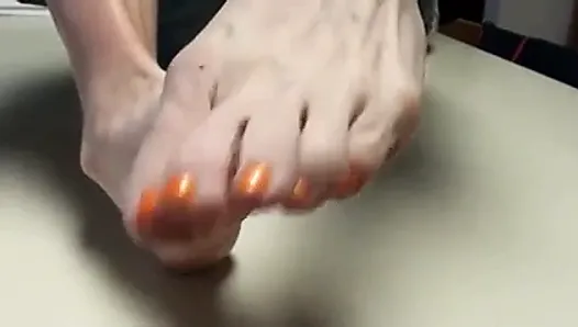 Old woman showing her feet